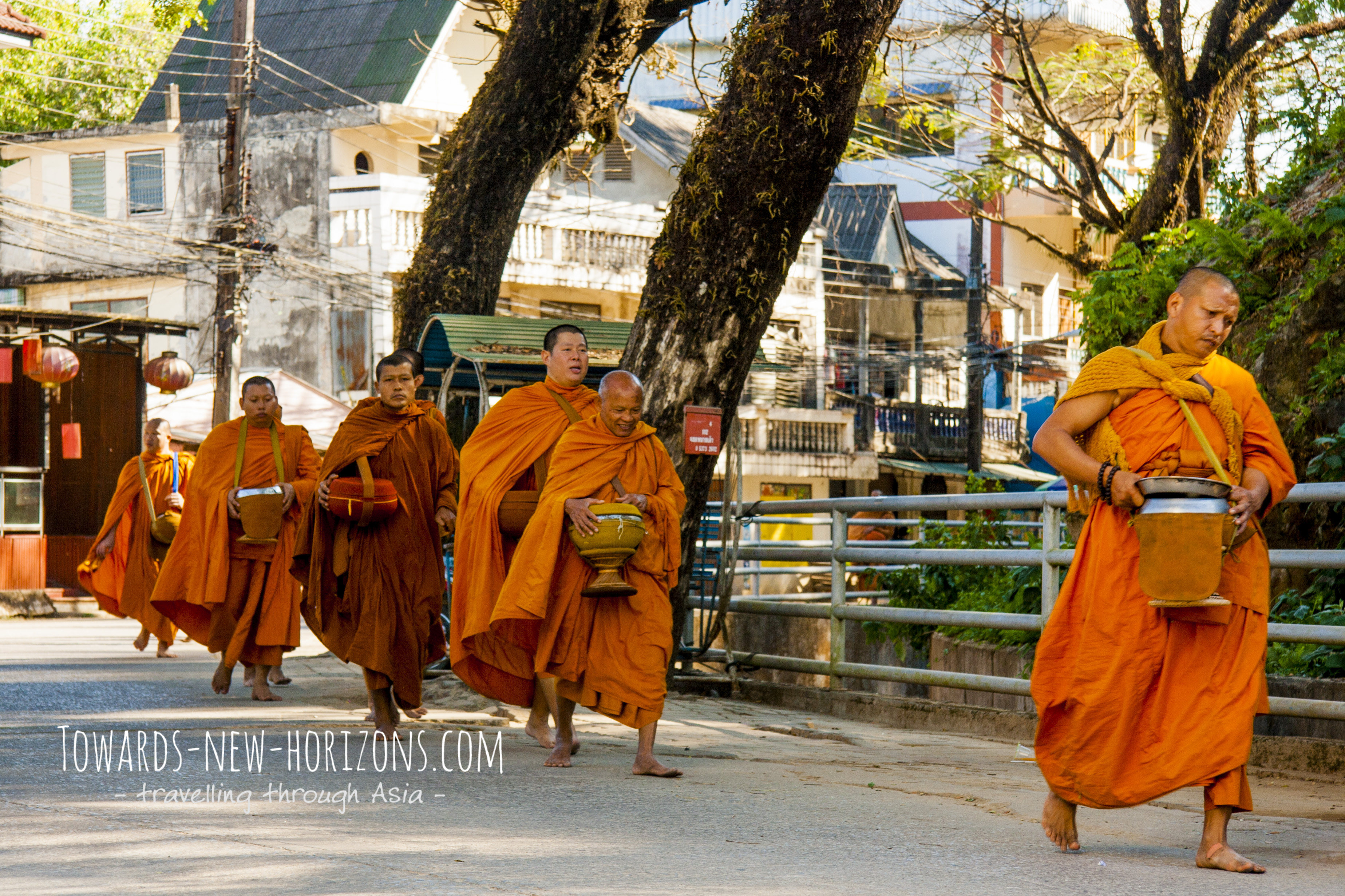 Monk Procession in the early morning in Mae Sai, Thailand